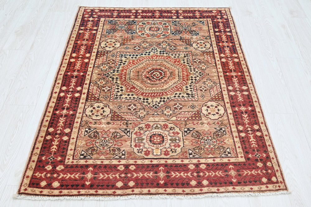 brown Accent rug 3' 4" x 4' 10"