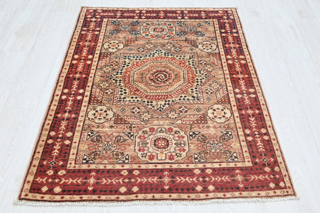 brown Accent rug 3' 4" x 4' 10"