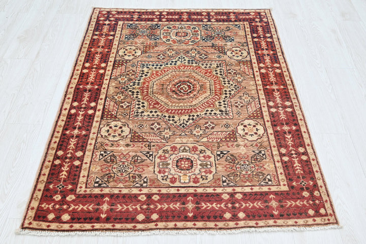brown Accent rug 3' 4" x 4' 10"