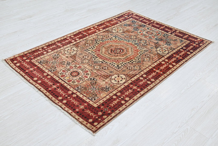 brown Accent rug 3' 4" x 4' 10"