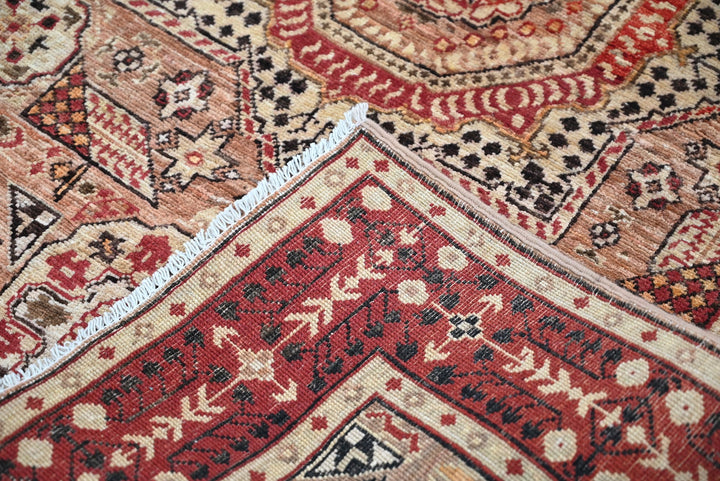 brown Accent rug 3' 4" x 4' 10"