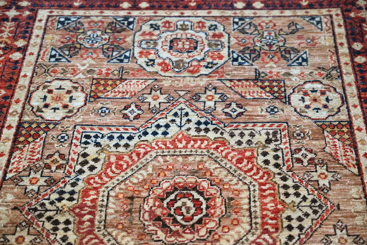 brown Accent rug 3' 4" x 4' 10"