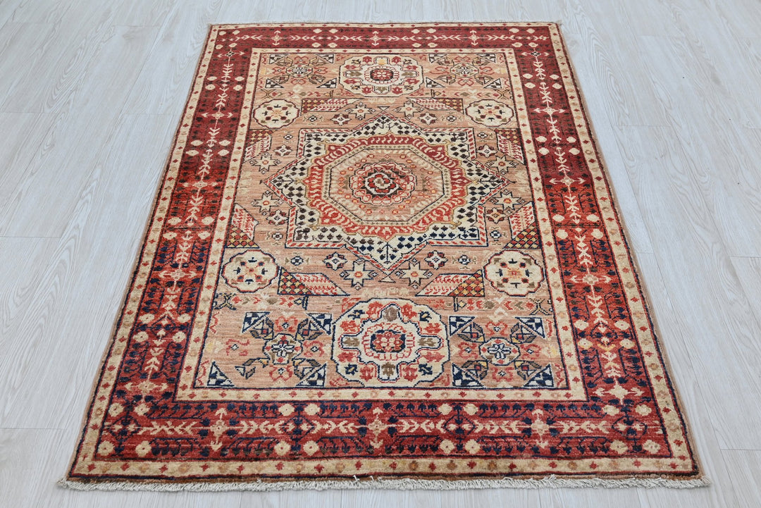 brown Accent rug 3' 4" x 4' 10"