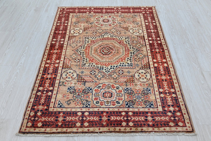 brown Accent rug 3' 4" x 4' 10"