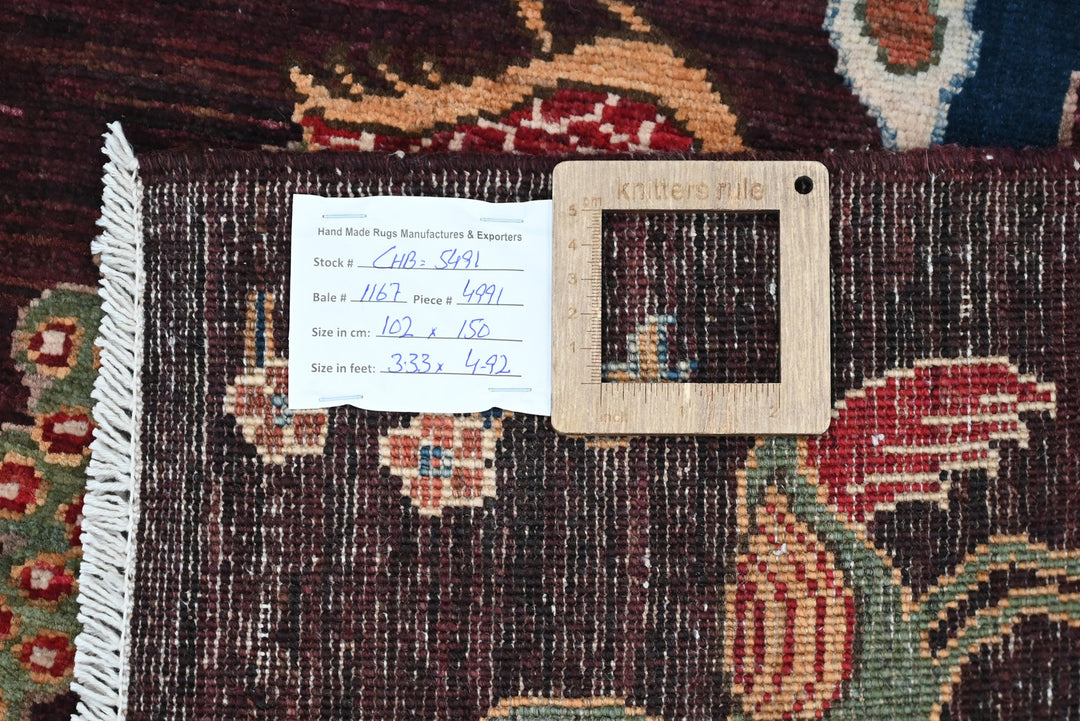 brown Accent rug 3' 4" x 4' 11"
