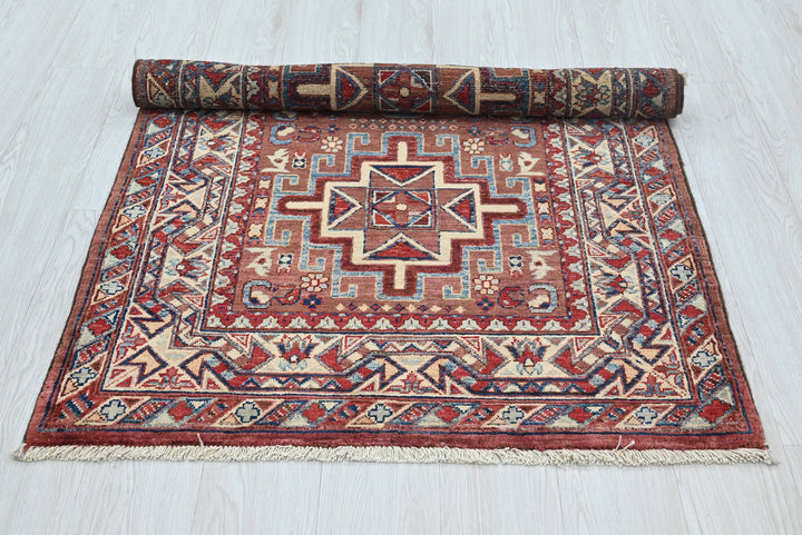 brown Accent rug 3' 3" x 4' 9"