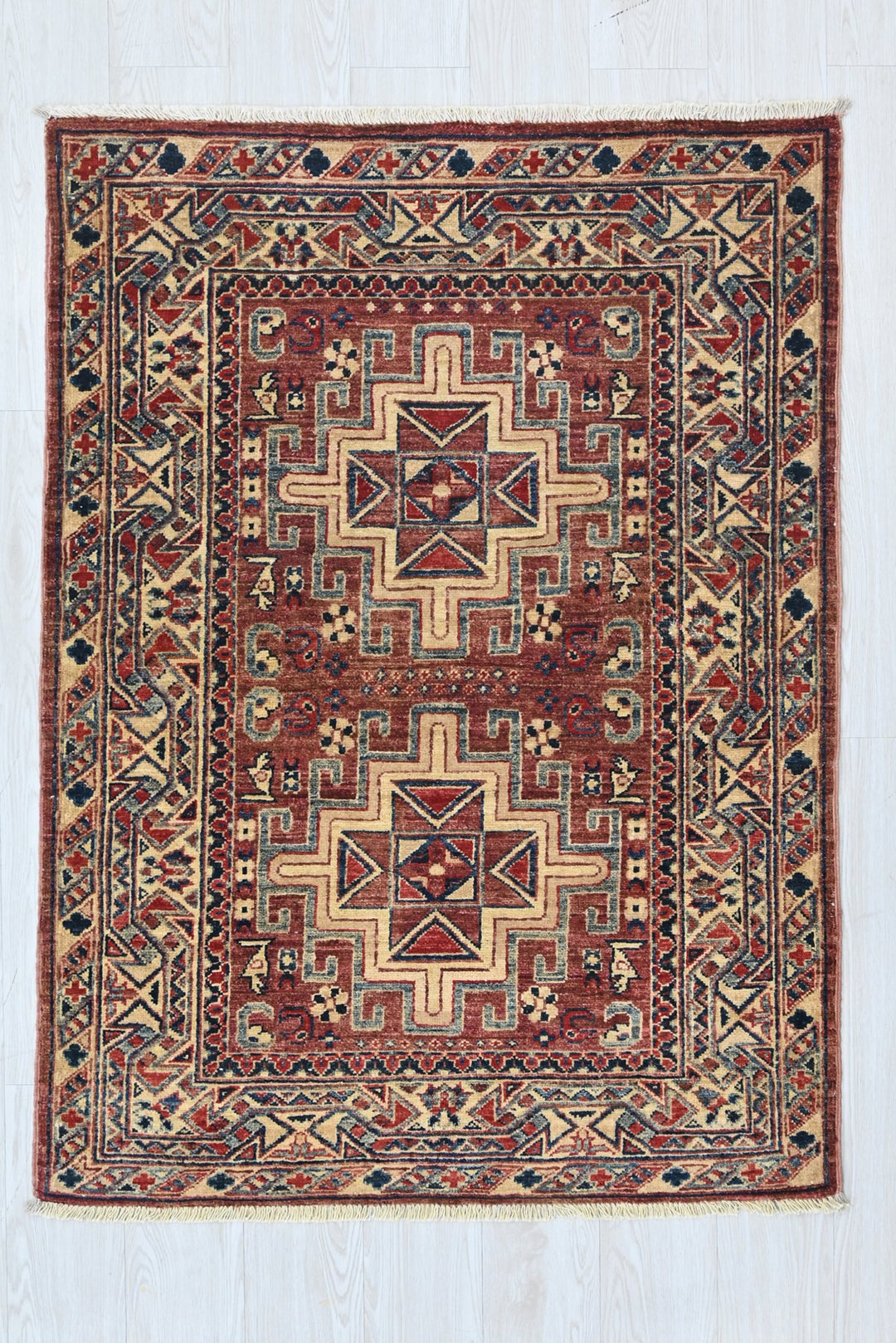 red Accent rug 3' 4" x 4' 10"