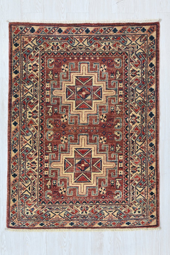 red Accent rug 3' 4" x 4' 10"