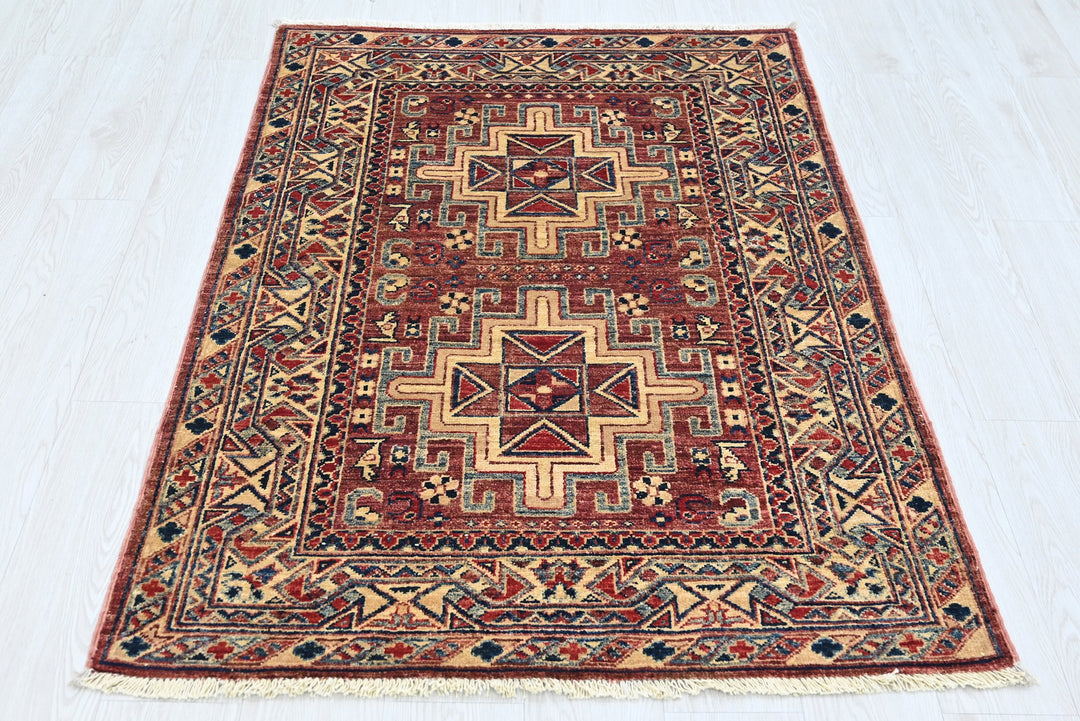 red Accent rug 3' 4" x 4' 10"