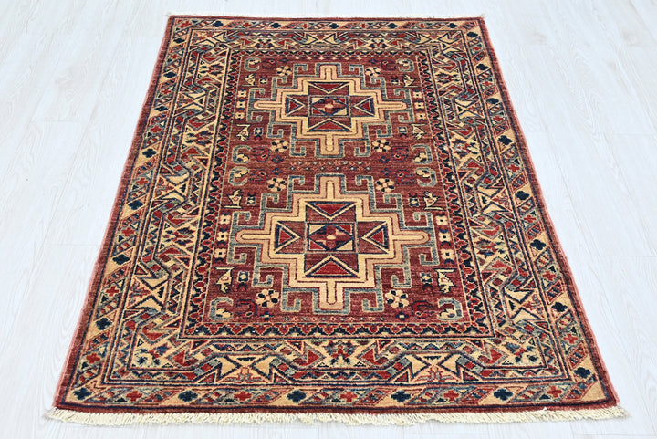 red Accent rug 3' 4" x 4' 10"