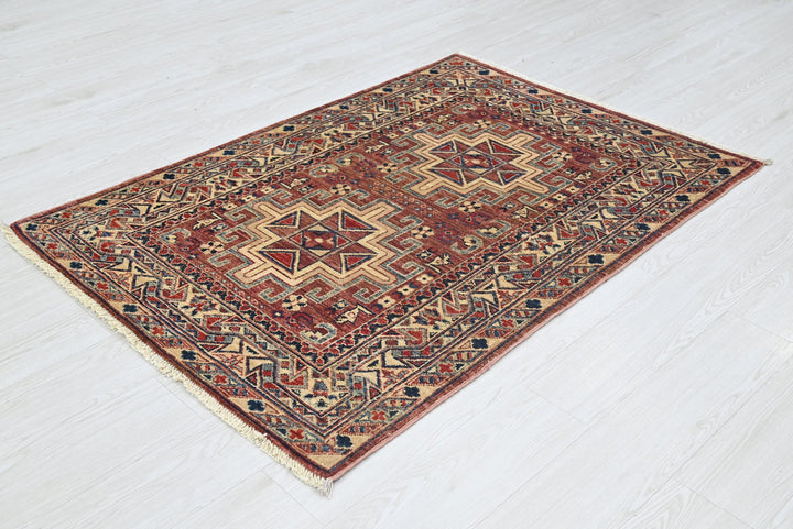 red Accent rug 3' 4" x 4' 10"