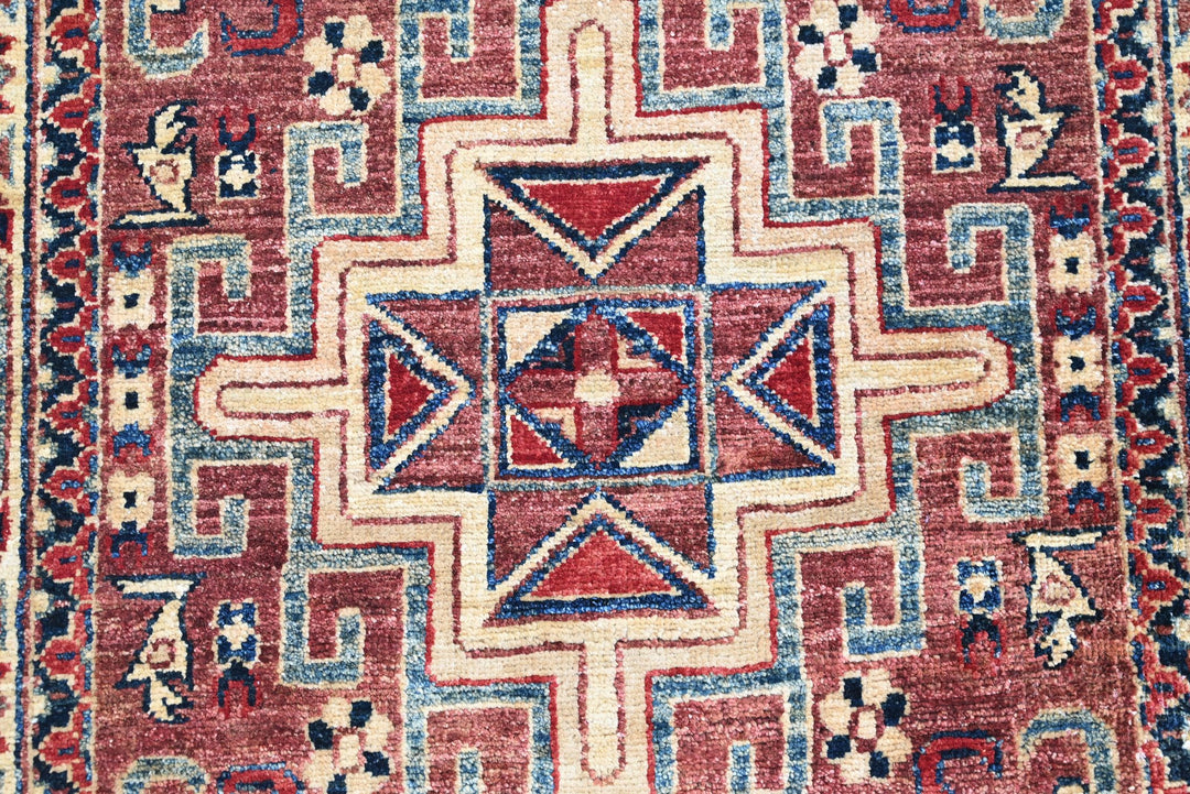 red Accent rug 3' 4" x 4' 10"