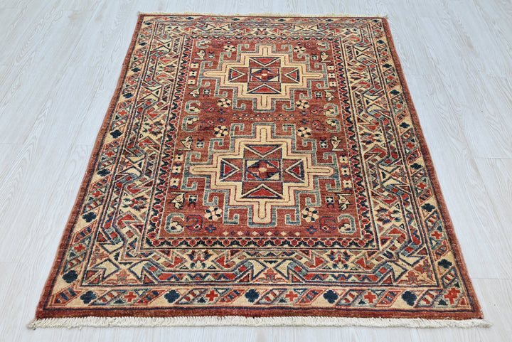 red Accent rug 3' 4" x 4' 10"