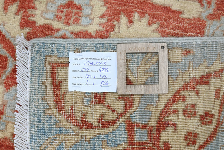 red Accent rug 4' 0" x 5' 8"