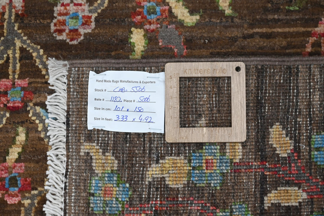 brown Accent rug 3' 4" x 4' 11"