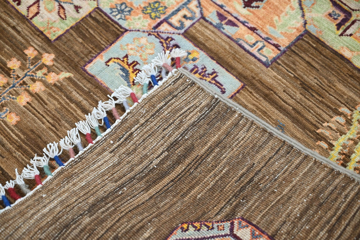 brown Accent rug 4' 1" x 5' 10"