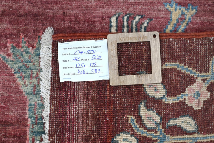 red Accent rug 4' 1" x 5' 10"