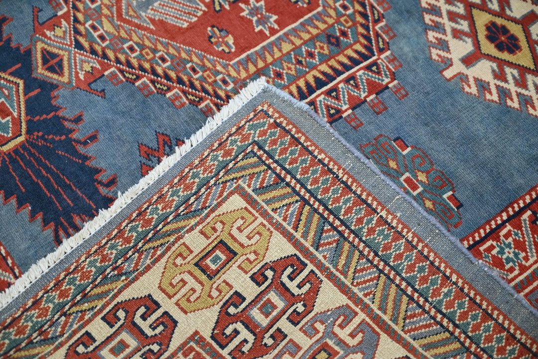blue Accent rug 4' 6" x 5' 10"