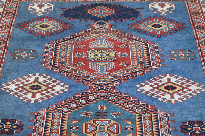 blue Accent rug 4' 6" x 5' 10"