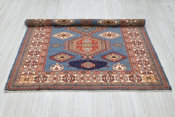 blue Accent rug 4' 6" x 5' 10"