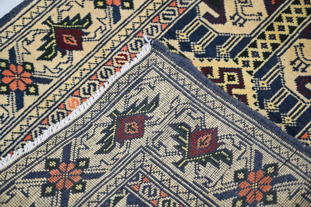 brown Accent rug 2' 4" x 4' 4"