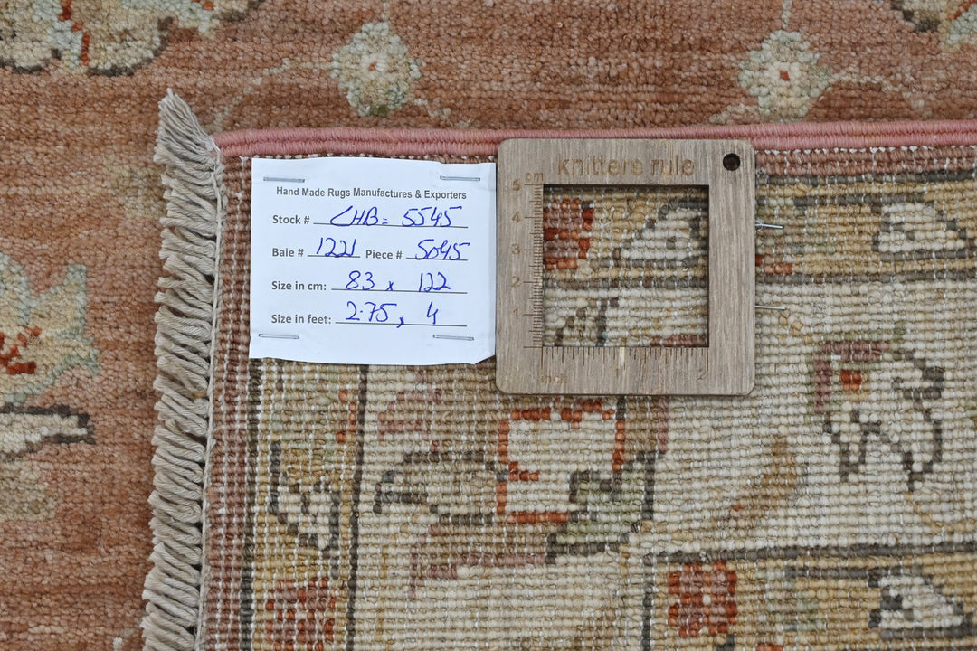 brown Accent rug 2' 9" x 4' 0"