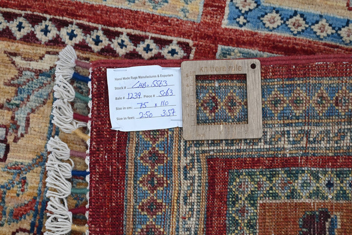 red Accent rug 2' 6" x 3' 7"