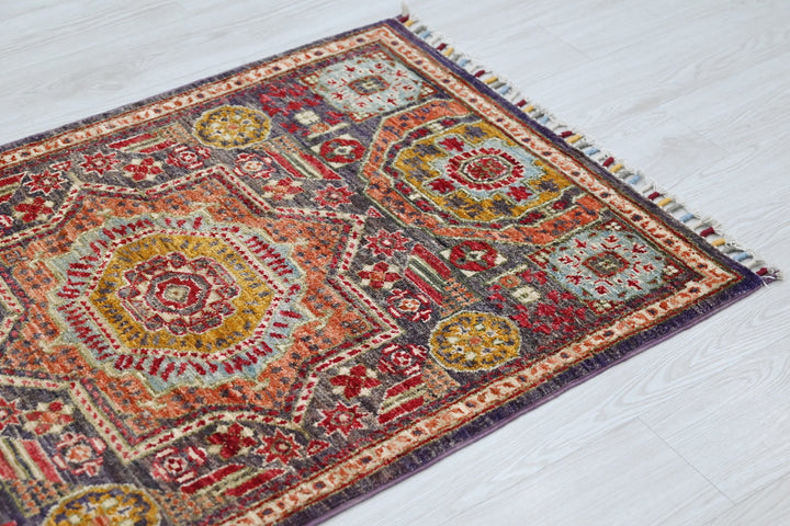 purple Accent rug 2' 9" x 4' 0"