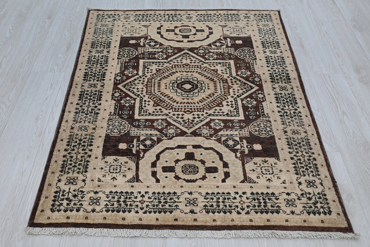 brown Accent rug 3' 3" x 4' 5"
