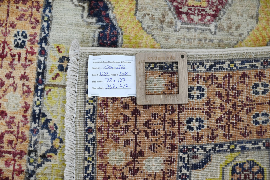 orange Accent rug 2' 7" x 4' 2"