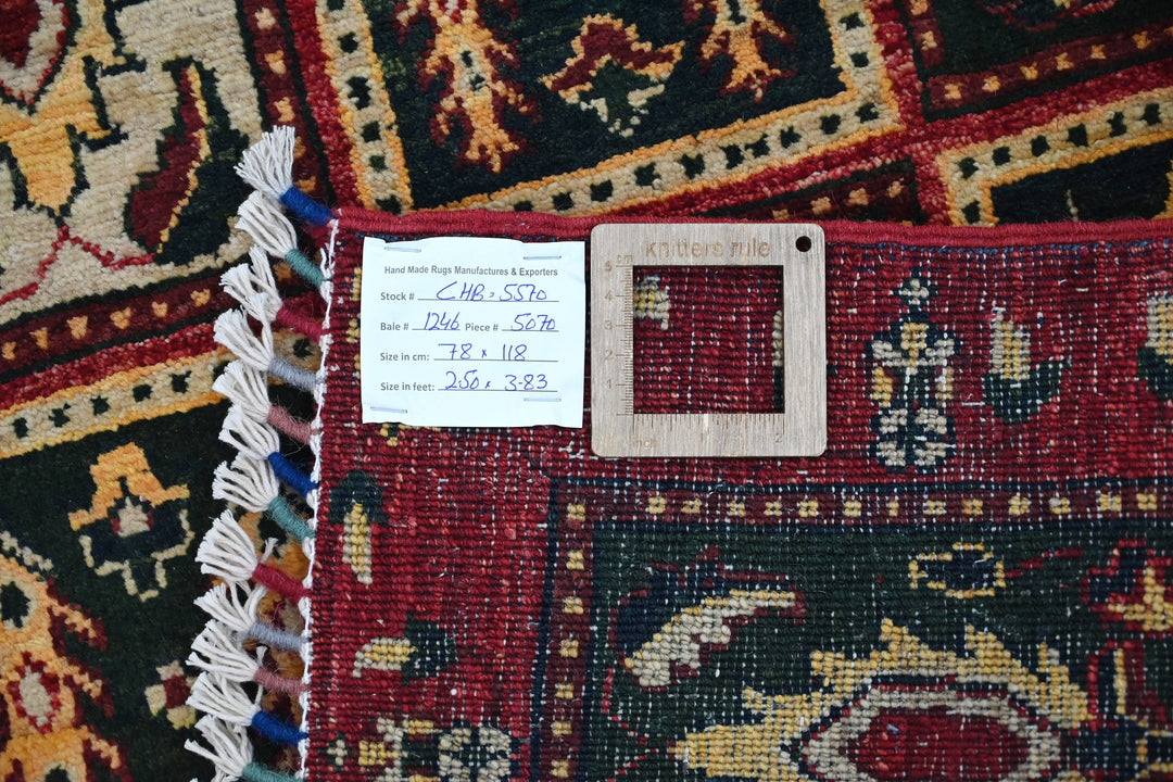 red Accent rug 2' 7" x 3' 10"