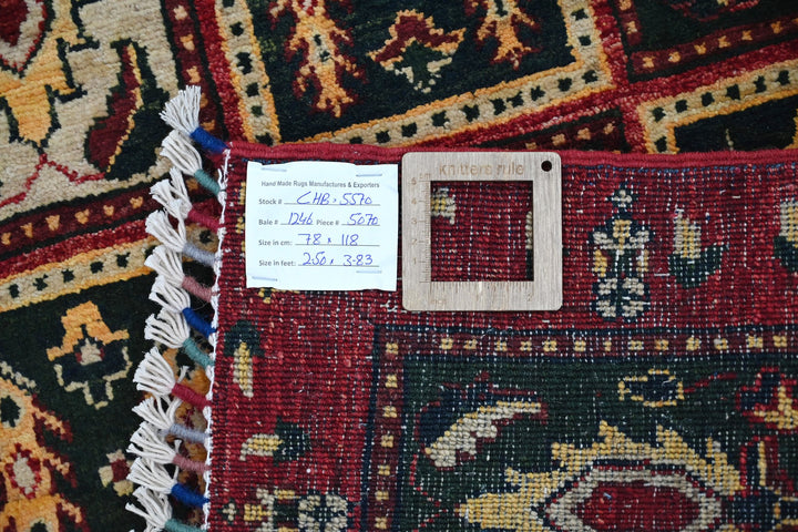 red Accent rug 2' 7" x 3' 10"