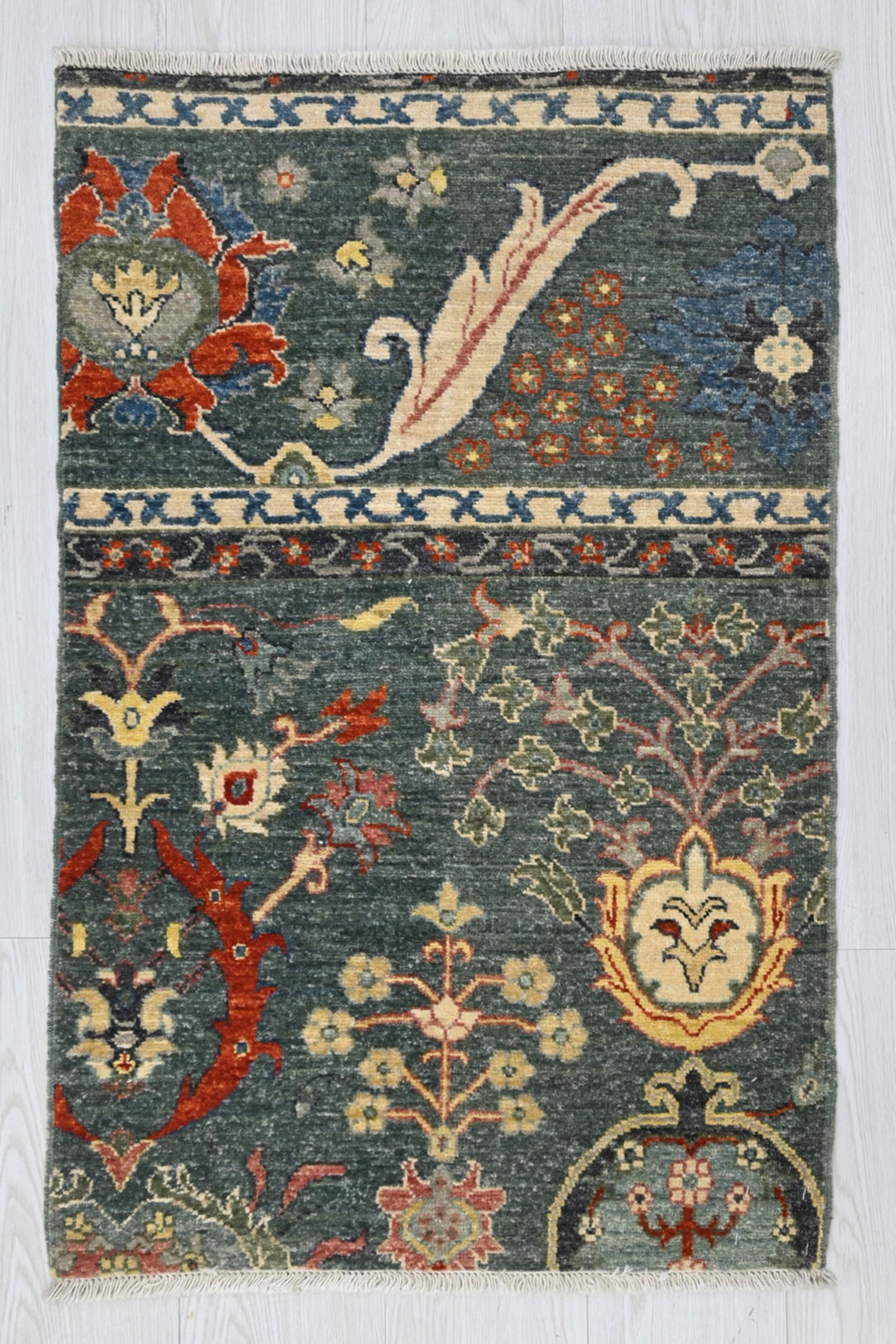 green Mini rug 1' 11" x 3' 1"