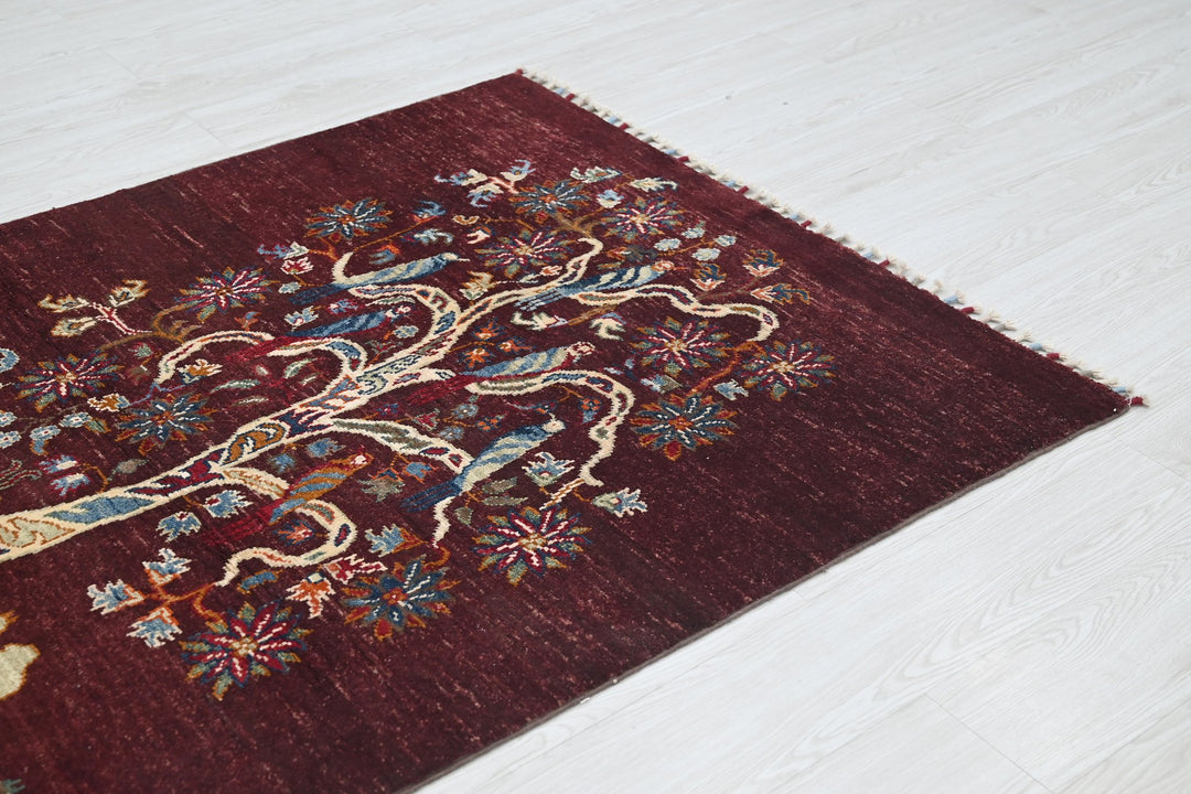 red Accent rug 3' 9" x 5' 10"