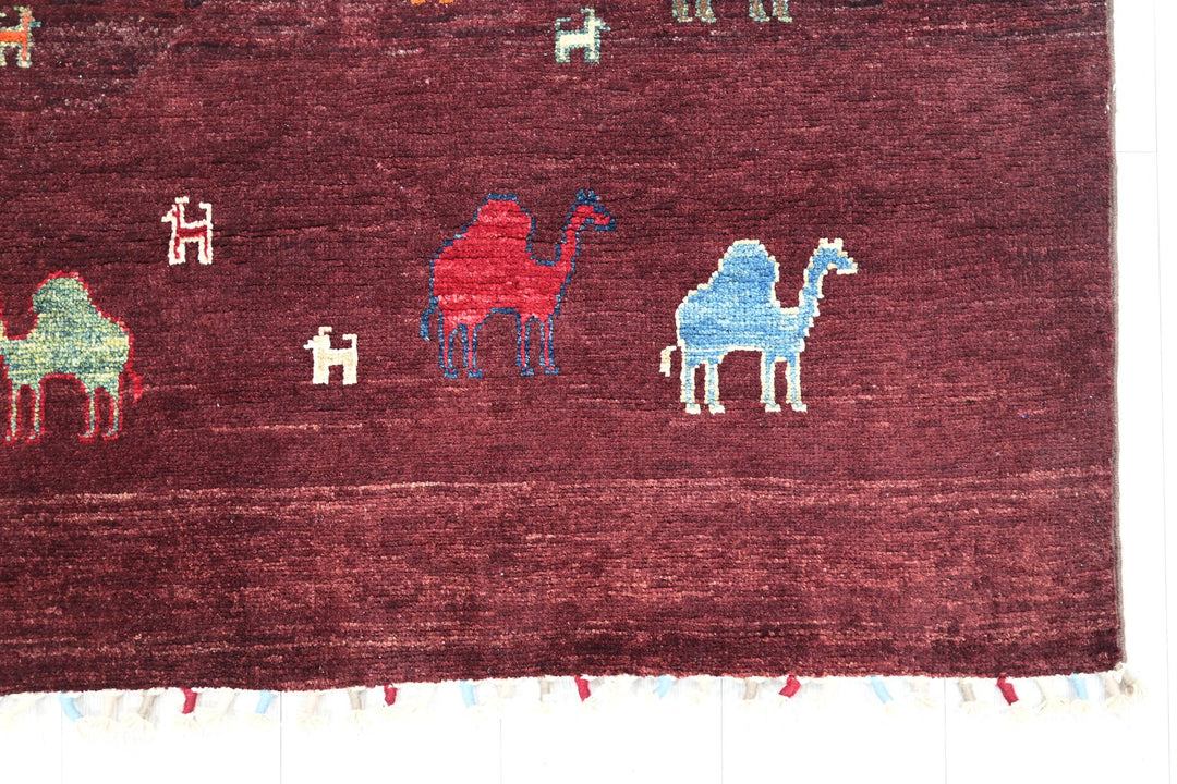 red Accent rug 3' 9" x 5' 10"