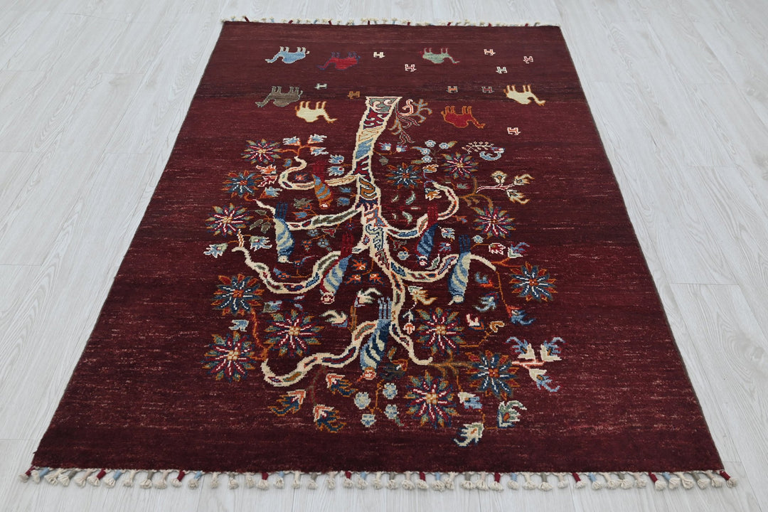 red Accent rug 3' 9" x 5' 10"