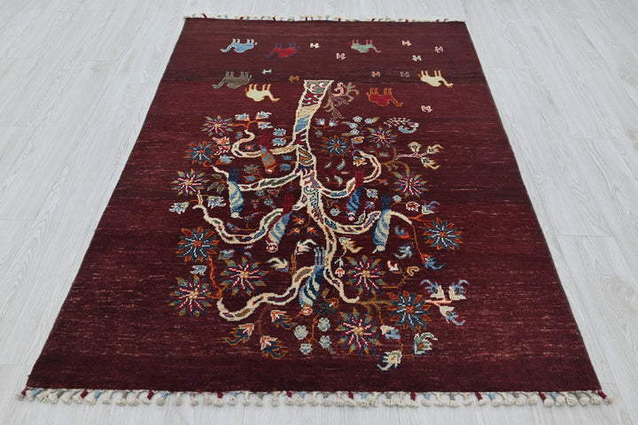 red Accent rug 3' 9" x 5' 10"