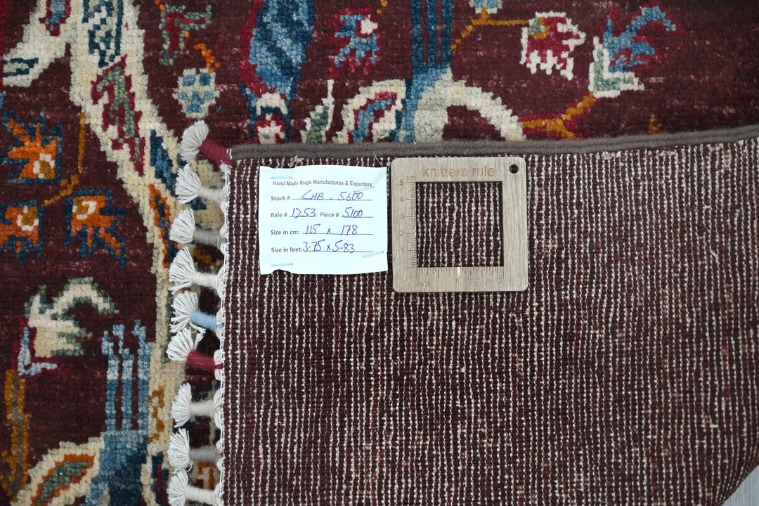 red Accent rug 3' 9" x 5' 10"