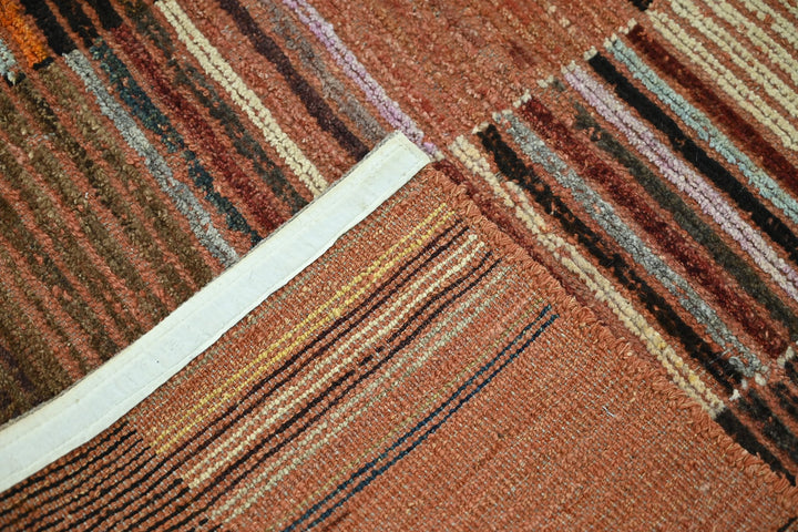 brown Large rug 7' 1" x 9' 4"