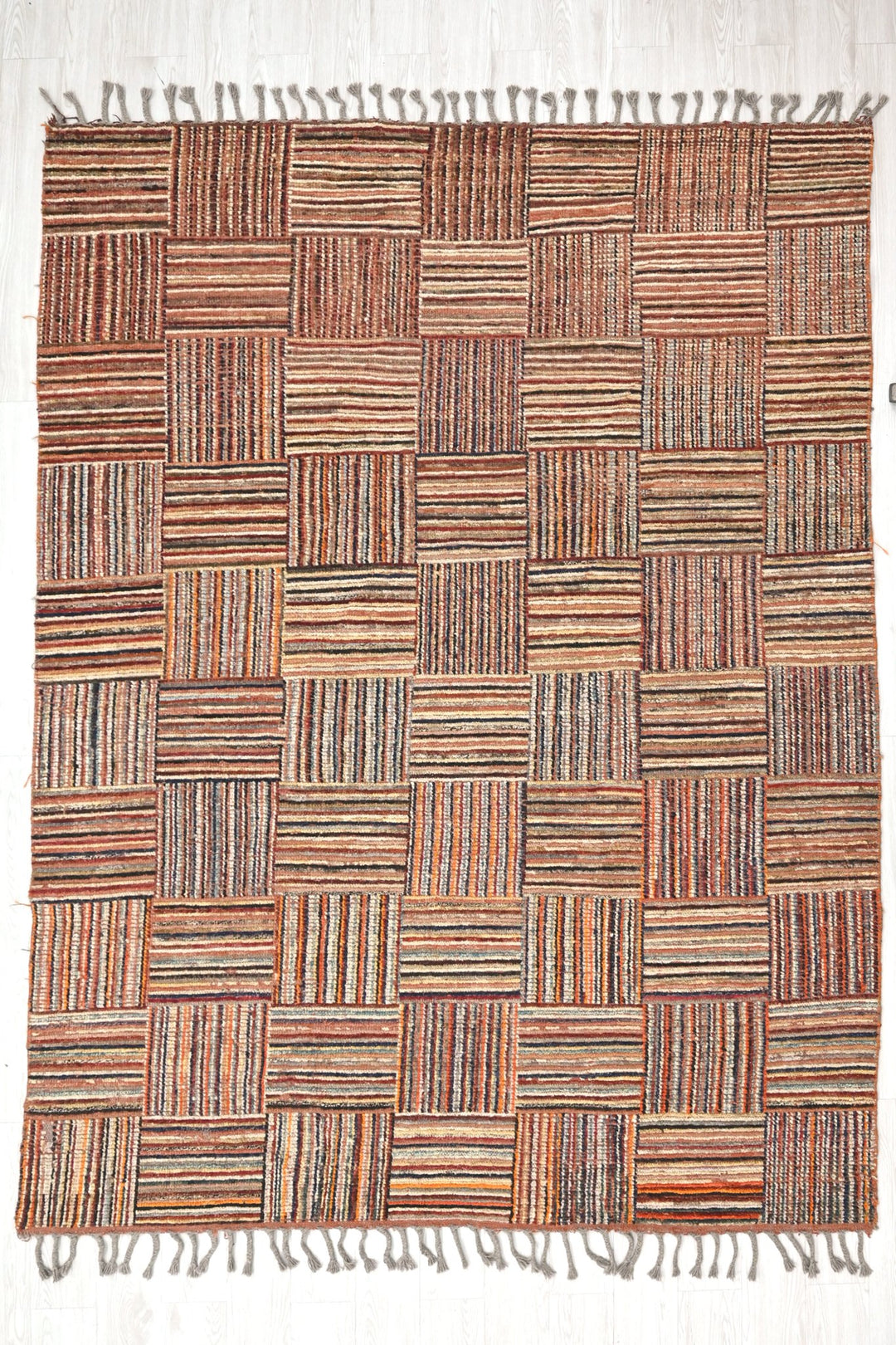 brown Large rug 6' 7" x 9' 3"