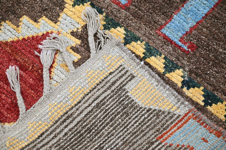 brown Accent rug 3' 9" x 5' 8"