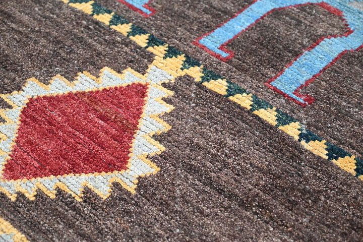 brown Accent rug 3' 9" x 5' 8"