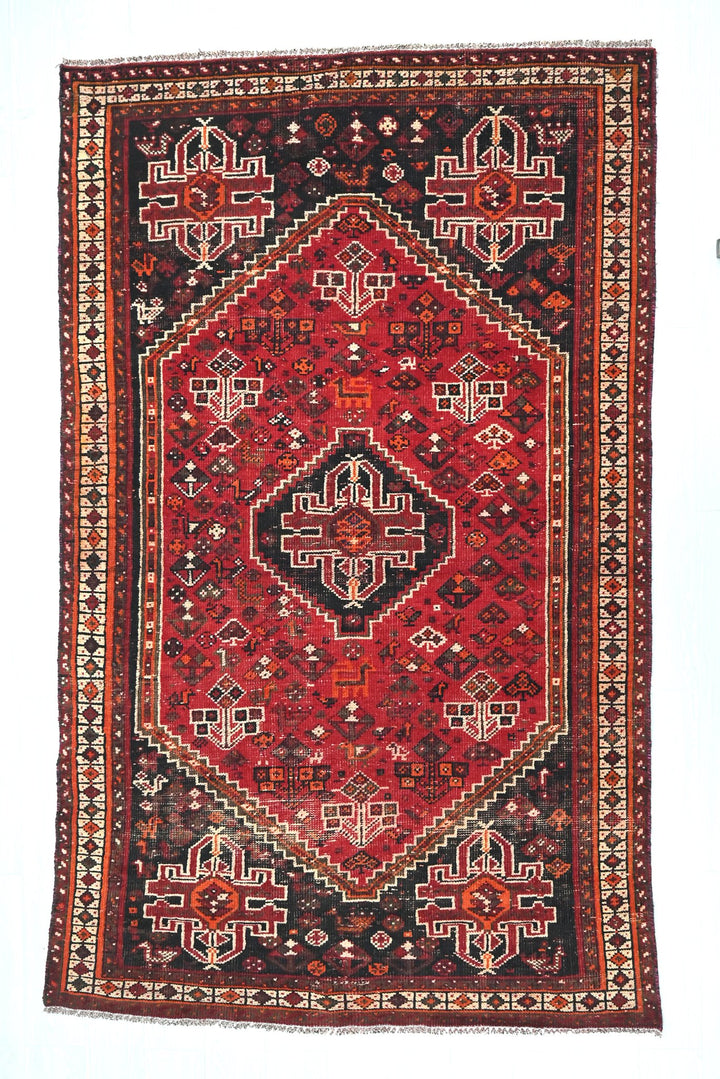 red Medium rug 4' 9" x 8' 2"