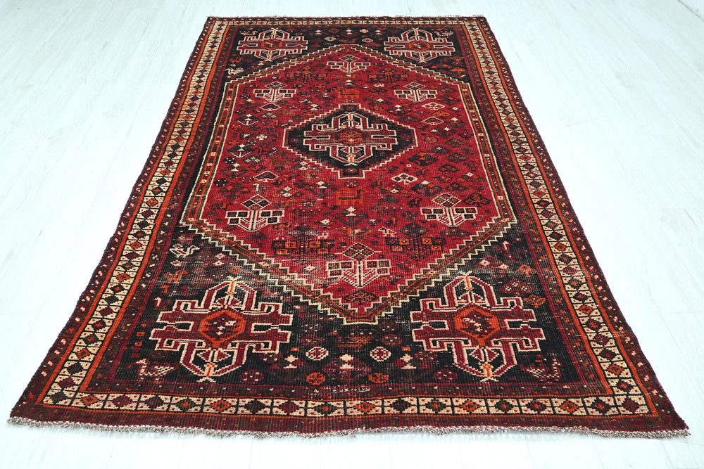 red Medium rug 4' 9" x 8' 2"