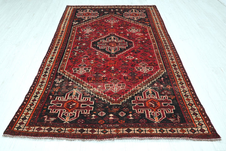 red Medium rug 4' 9" x 8' 2"