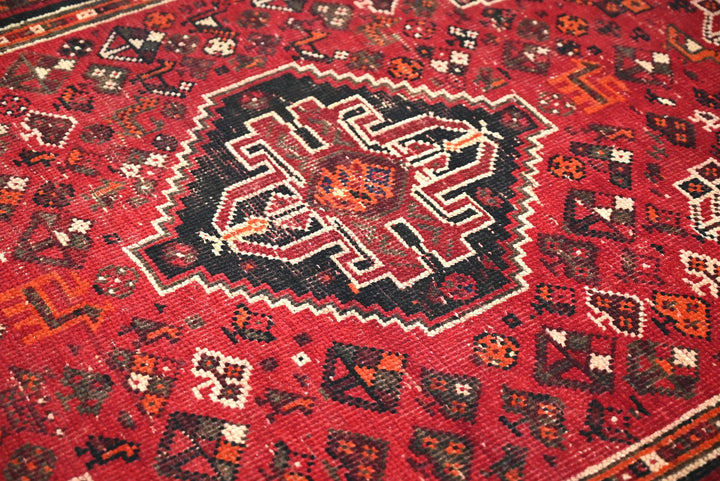red Medium rug 4' 9" x 8' 2"