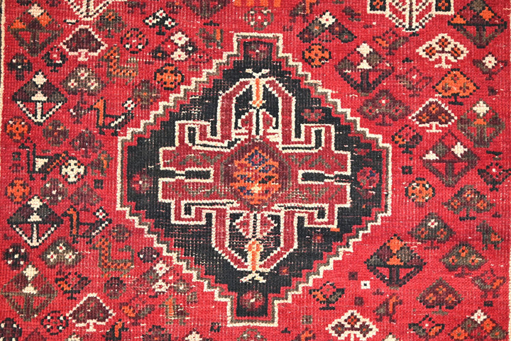 red Medium rug 4' 9" x 8' 2"