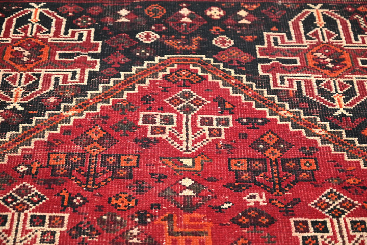 red Medium rug 4' 9" x 8' 2"