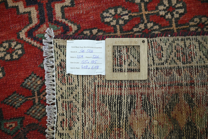 red Accent rug 4' 1" x 6' 1"