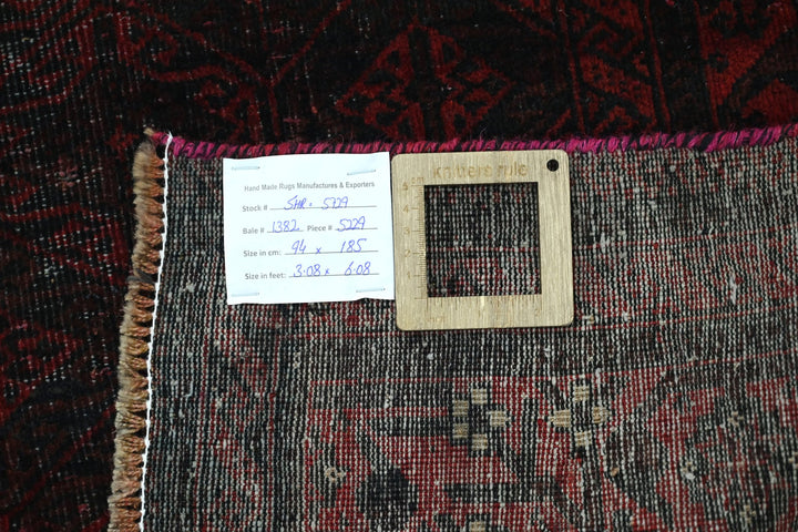 red Accent rug 3' 1" x 6' 1"